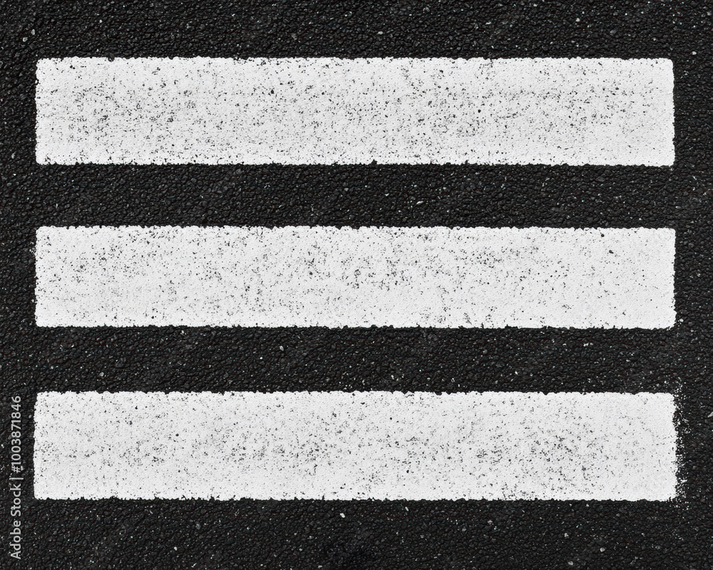 Fototapeta premium Abstract black and white image of three horizontal stripes on a textured background.