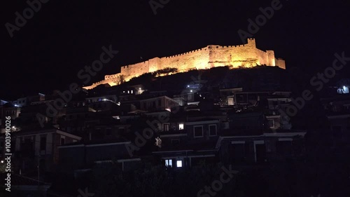 Molivos castle at night viewed from down the hill in Mythimna, island of Lesvos, Greece photo