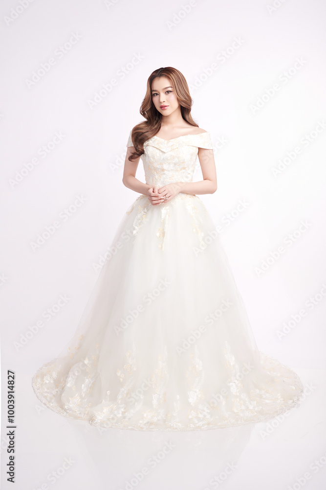Beautiful young asian woman in wedding dress on white background, Beautiful young asian woman in wedding dress on white background,