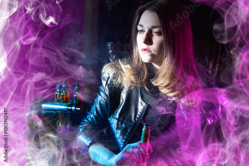 Woman vaper. Girl with vape...