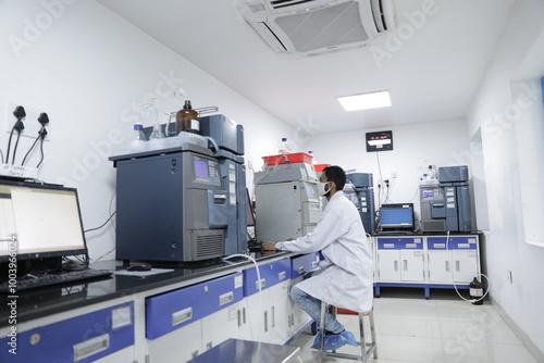 science laboratory with hplc, spectrometer, gc, uv, ir in background. hi tech latest machines and equipments in a Science experiment lab for research analysi, clinical trial study. fda approved labs	