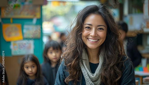 a person smiling with a group of children behind her