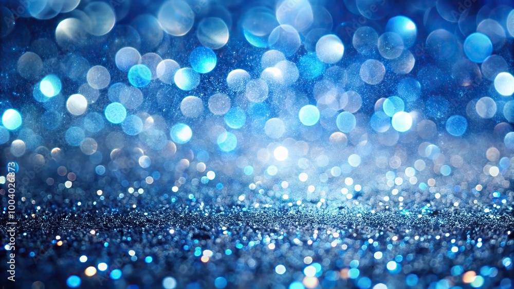 Wide-angle abstract background with glowing blue, gold, and silver glitter bokeh circles particles