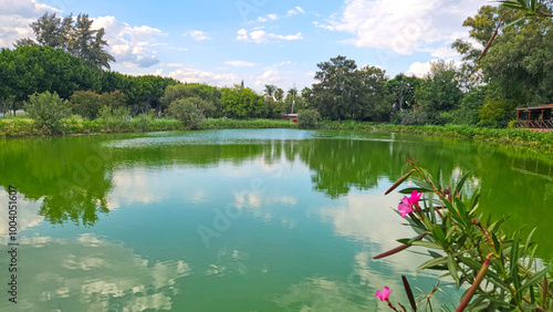 An autumnal view of a freshwater lake built for recrational purposes in Medterranean region photo