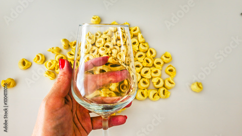 Cheese-filled pasta from Italian cuisine in the kitchen with isolated white background  photo