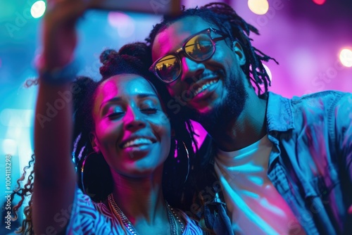 A couple smiling together while taking a selfie