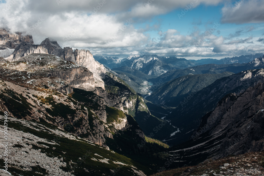 Naklejka premium Dolomite mountains in Austria among the clouds