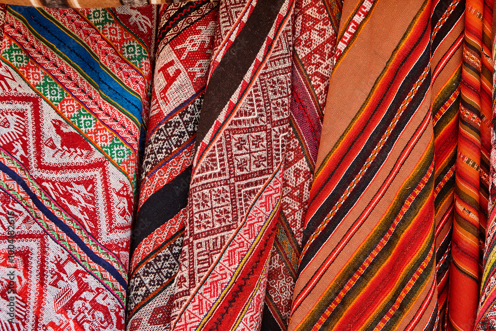 Ollantaytambo is known for its high-quality weaving and colorful textiles, often made using traditional Inca techniques./ Cusco Peru. Ollantaytambo is known for its high-quality weaving and colorful textiles, often made using traditional Inca techniques./ Cusco Peru.