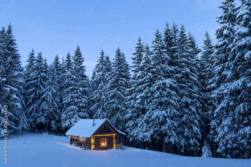 Fairy Christmas landscape with glowing wooden cabin in snowy forest. Cozy house in winter mountains Fairy Christmas landscape with glowing wooden cabin in snowy forest. Cozy house in winter mountains