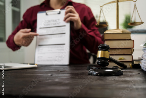 Wallpaper Mural A male lawyer is working at his desk on an online judicial review, focusing on justice, fairness, and legal compliance.He reviews cases, contracts, and legal matters based on general law principles Torontodigital.ca