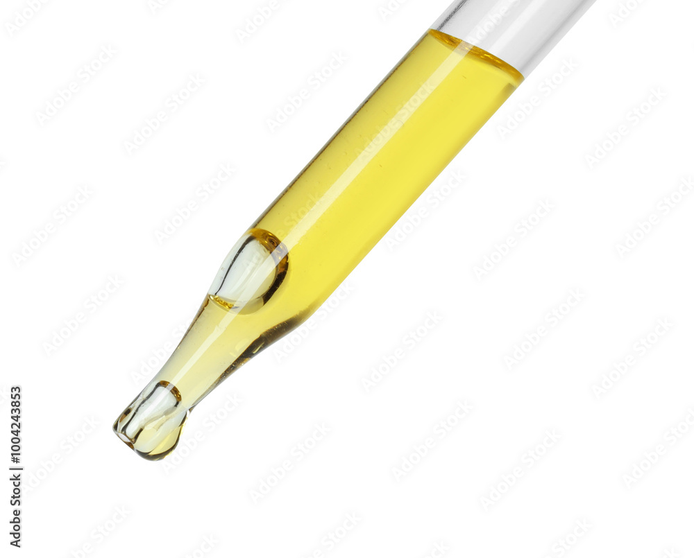 Dripping essential oil from pipette on white background Dripping essential oil from pipette on white background