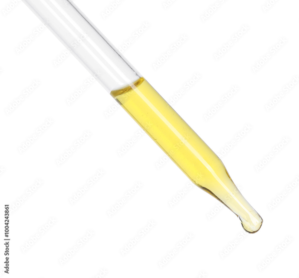 Dripping essential oil from pipette on white background Dripping essential oil from pipette on white background