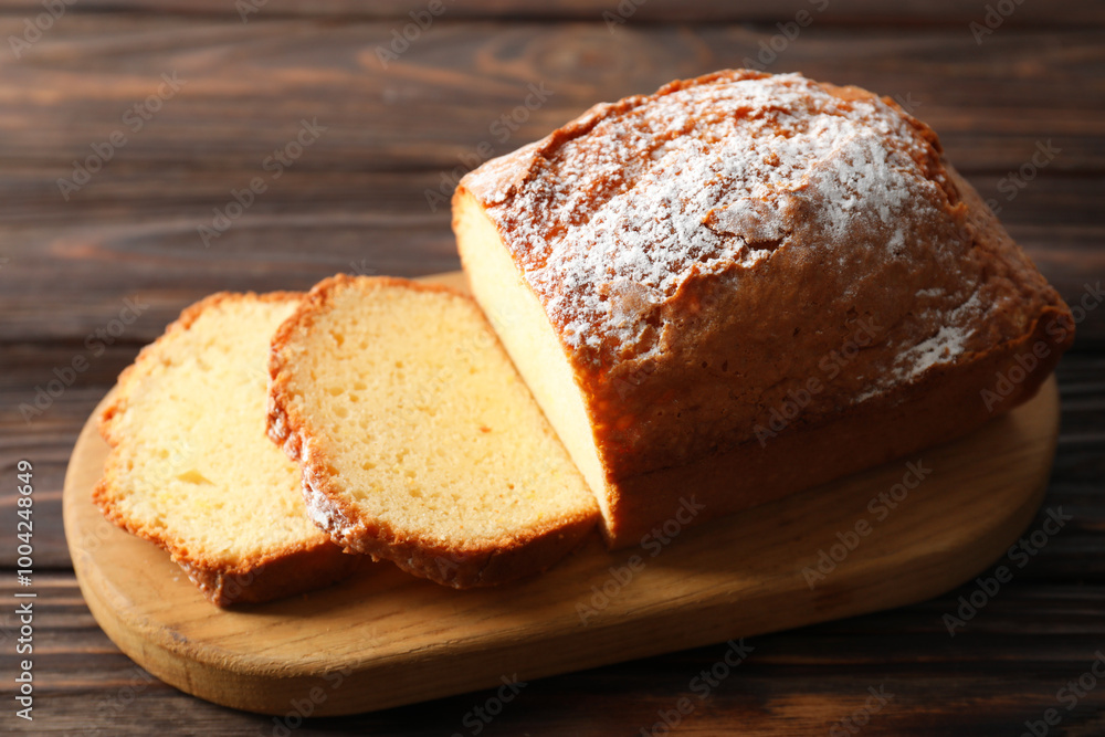 Freshly baked sponge cake on wooden table Freshly baked sponge cake on wooden table