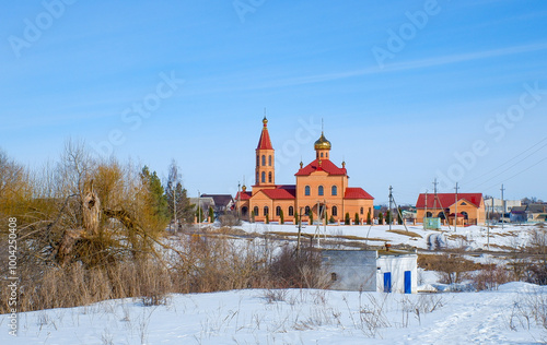 A small town with a church and a few houses