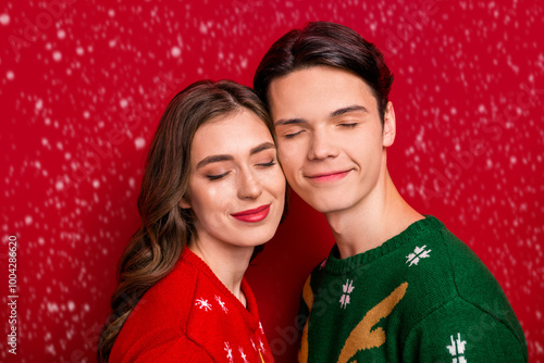 Photo of two soulmates partners closed eyes touch heads isolated on vibrant red color background