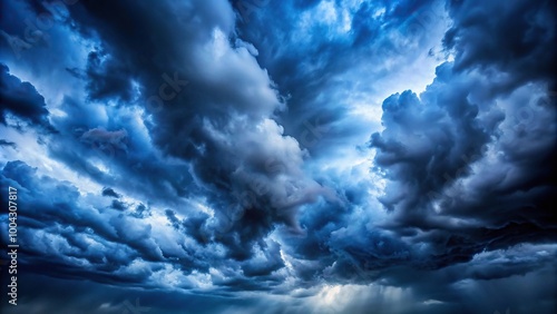 Moody stormy sky with dark blue clouds, perfect for background or weather-related designs