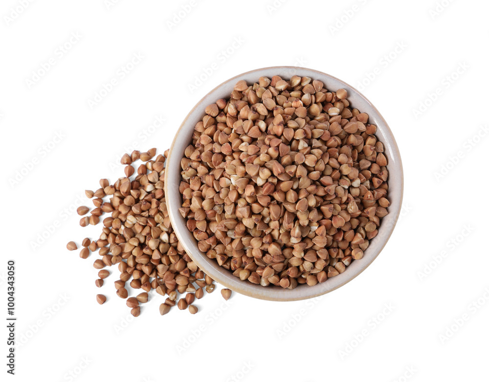 Raw buckwheat in bowl isolated on white, top view Raw buckwheat in bowl isolated on white, top view