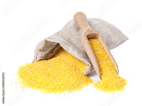 Raw cornmeal in burlap with scoop isolated on white