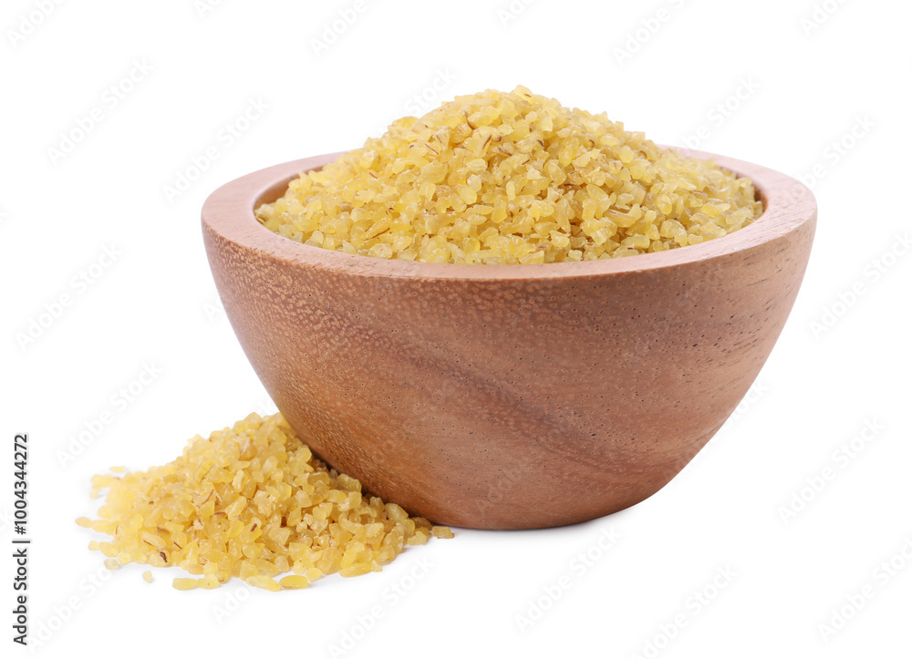 Raw bulgur in wooden bowl isolated on white Raw bulgur in wooden bowl isolated on white