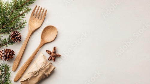 Wooden kitchen utensils with pinecones and festive decorations, perfect for holiday cooking.