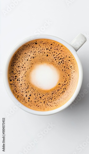 Creamy cappuccino in a white cup surrounded by coffee beans on a soft fabric ...
