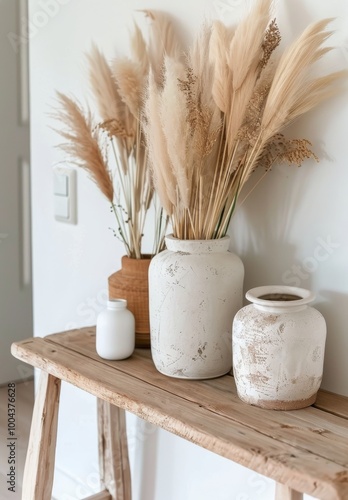Elegant Natural Decor Arrangement on Wooden Bench With Candles and Dried Foliage