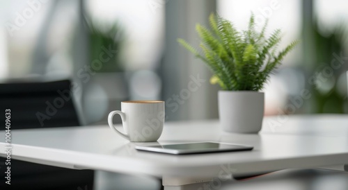 Modern Workspace With Tablet and Potted Plant in Bright Office Environment
