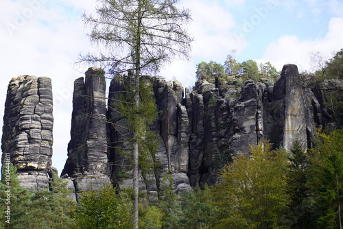 The Affensteine are a long chain of deeply fissured rocks in the Elbe Sandstone Mountains that are located east of Bad Schandau in the German region of Saxon Switzerland. photo