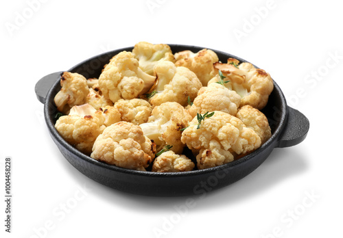 Baked cauliflower in baking dish on white background