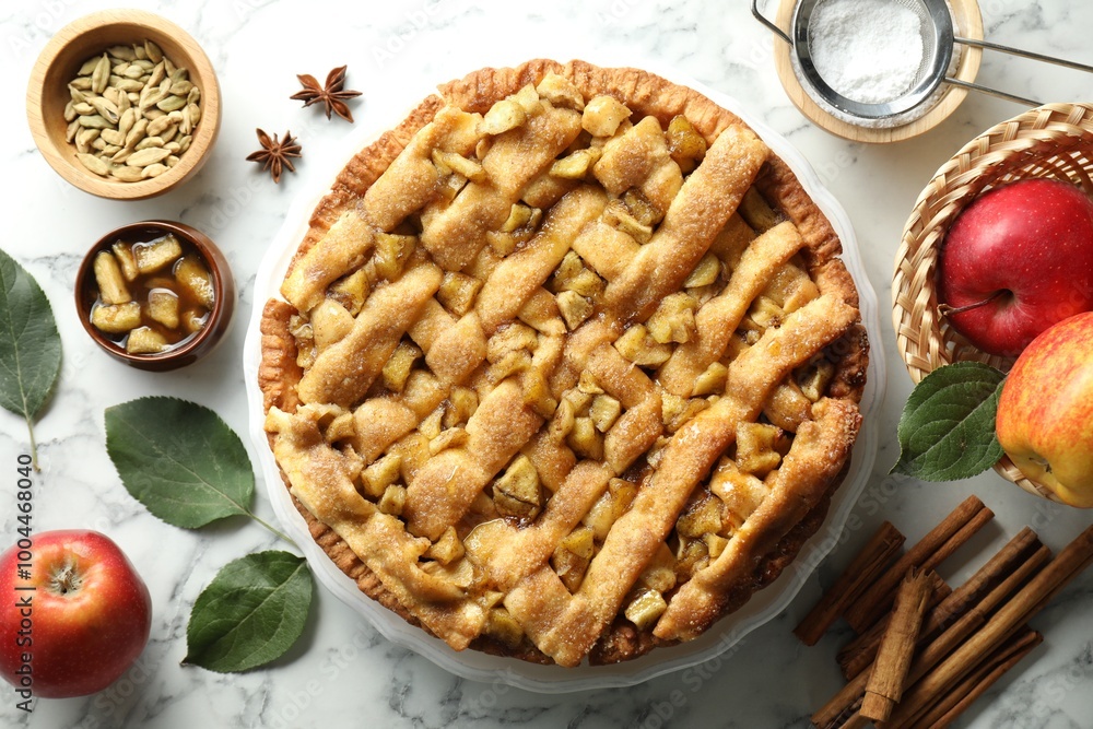 Homemade apple pie and ingredients on white marble table, flat lay Homemade apple pie and ingredients on white marble table, flat lay