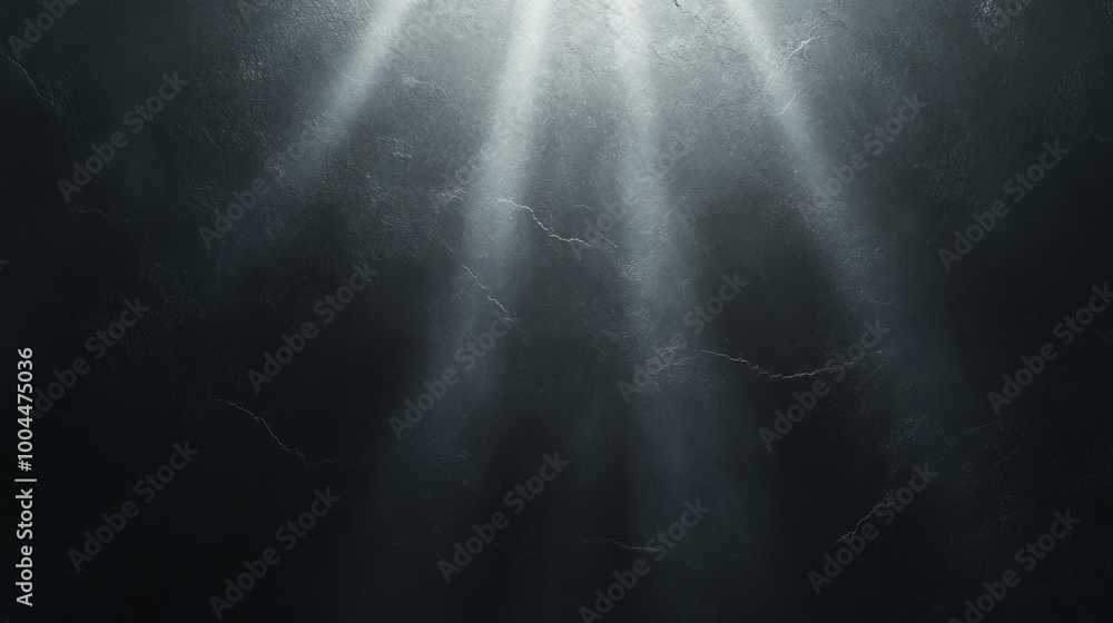 A black and white photo of a light shining on a wall A black and white photo of a light shining on a wall