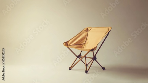 A portable camping chair that folds up, shown against a plain white background.