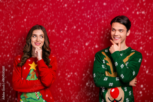 Photo of dreamy pretty best friends dressed x-mas jumpers arms chin looking empty space isolated red color background