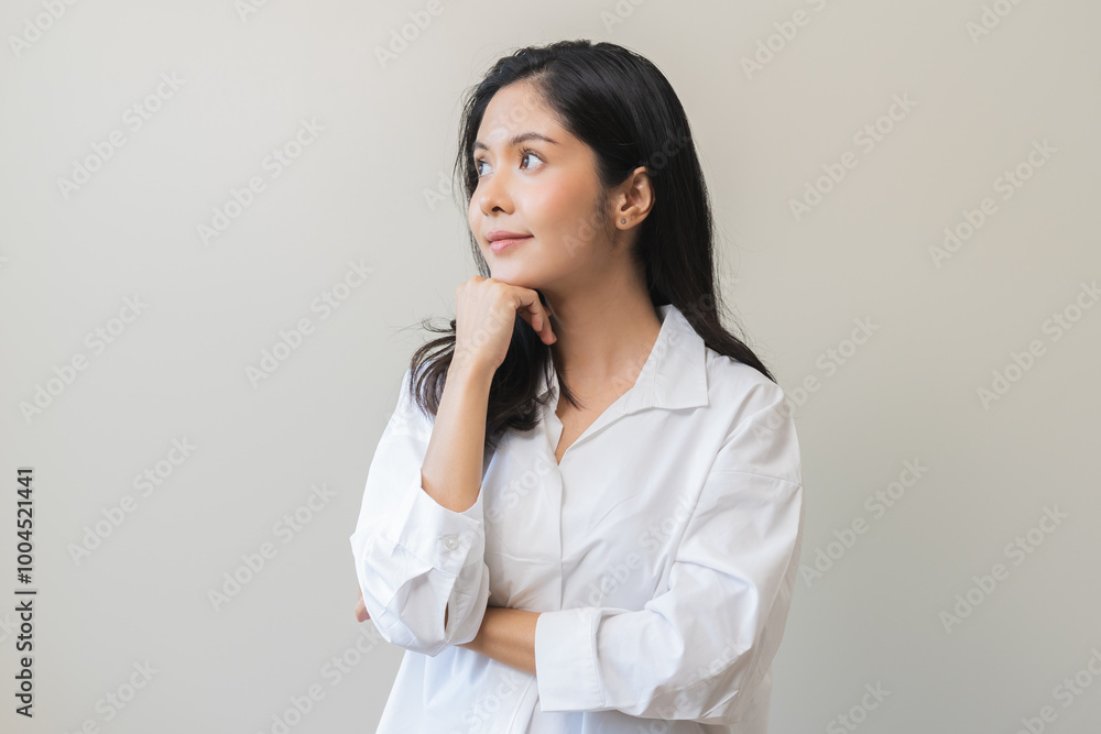 Smile positive, happy asian young woman wearing casual shirt, portrait of pretty female with black long hair feeling prond, standing expression gesture face relax looking at camera on white background Smile positive, happy asian young woman wearing casual shirt, portrait of pretty female with black long hair feeling prond, standing expression gesture face relax looking at camera on white background