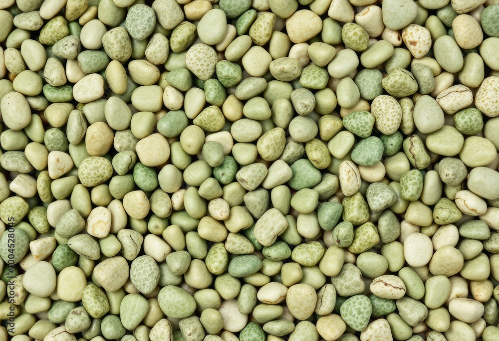 Cluster of tiny pebbles in various shades of green arranged in a Cluster of tiny pebbles in various shades of green arranged in a