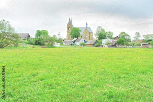 View of wooden houses in the town of Raków in Belarus, formerly Polish territory photo