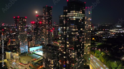 Wallpaper Mural Aerial video of Manchester skyline with a full Moon above the high-rises.  Torontodigital.ca