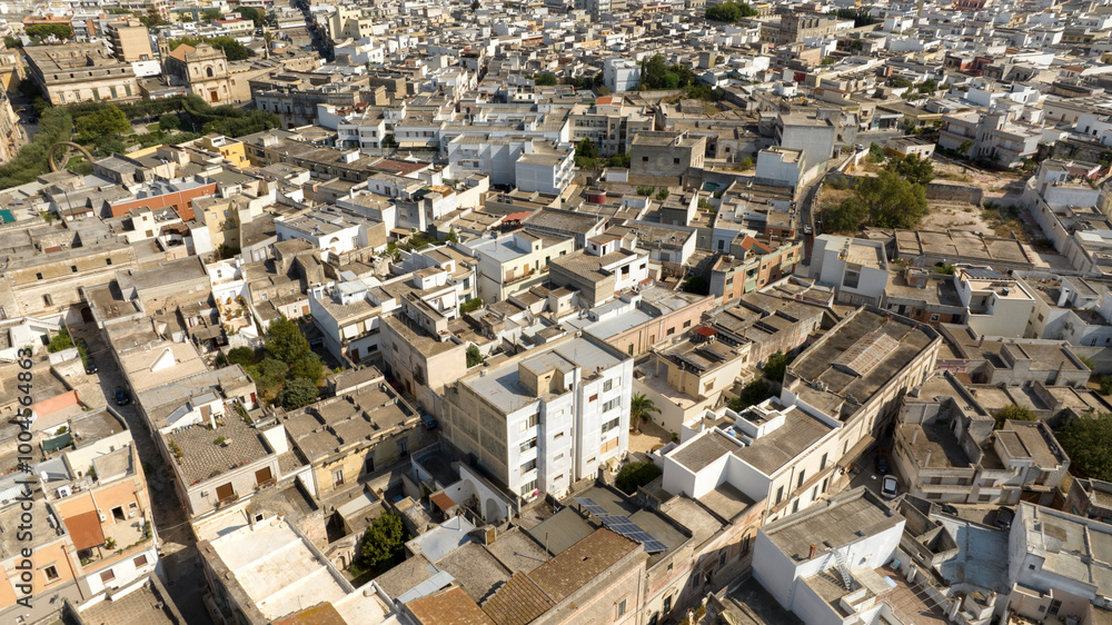 Aerial view of houses and apartments in the historic center of Manduria. It is a city in the province of Taranto, Puglia, Italy. Aerial view of houses and apartments in the historic center of Manduria. It is a city in the province of Taranto, Puglia, Italy.