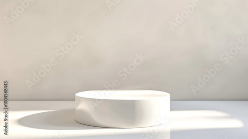 minimalist white podium sits elegantly against soft, neutral background, creating serene and modern atmosphere. This versatile display piece is perfect for showcasing products or art. 