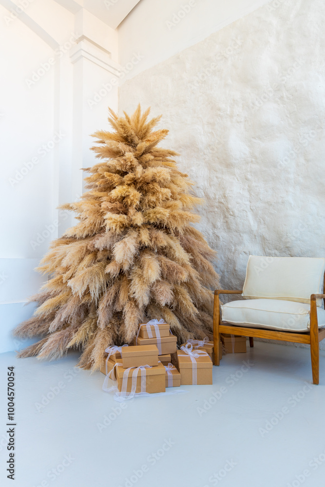 Obraz premium beige artificial spruce and a bench on a white wall background