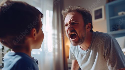 A father is yelling at his son in their living room, creating a tense atmosphere between them. Father scolding his son in the living room during a heated moment.