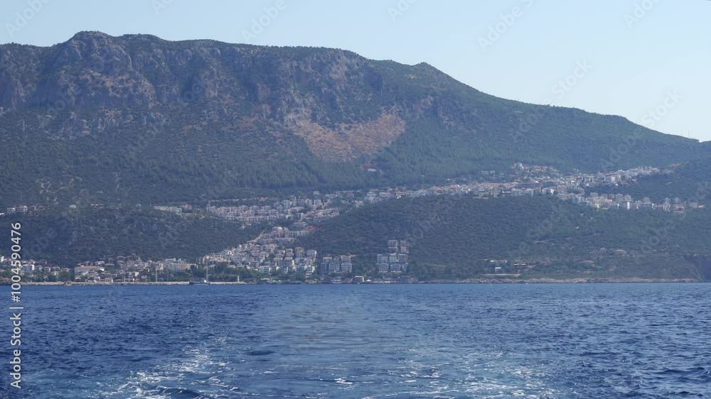 Panoramic Kas city view and mountains from the Mediterranean, Antalya, Turkey. Panoramic Kas city view and mountains from the Mediterranean, Antalya, Turkey.
