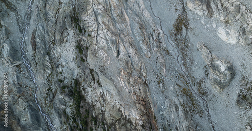 Aerial View of Rugged Rocky Terrain with Water Stream in BC, Canada photo