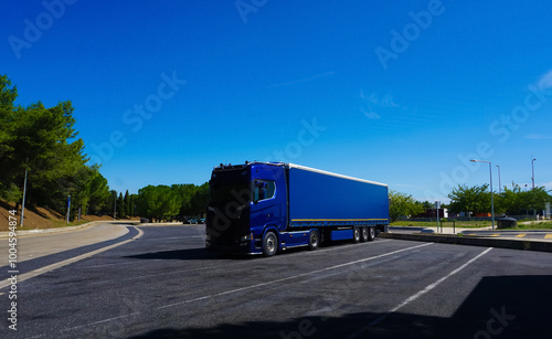 Obraz na płótnie Trucks at parking lot. Delivery Trucks. Cargo Shipping. Lorry. Industry Freight Truck Logistics Cargo Transport Concept. w salonie