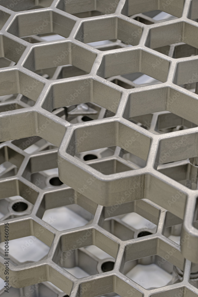 Openwork three-dimensional metal grid with hexagonal cells Openwork three-dimensional metal grid with hexagonal cells