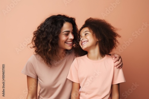 Happy mother and daughter smiling