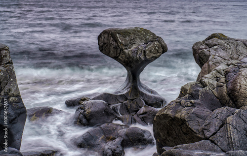 Majestic kannesteinen rock at sunset along the norwegian coastline photo