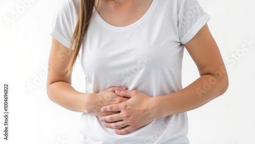 Wallpaper Mural Cropped shot of a young woman in a white t-shirt holding her side with her hands isolated on a white background Torontodigital.ca