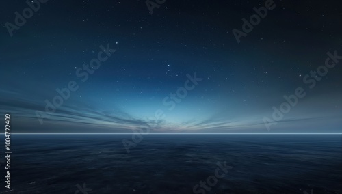 Fototapeta Naklejka Na Ścianę i Meble -  Dark blue sky with a few stars and a large body of water. The water is calm and the sky is clear
