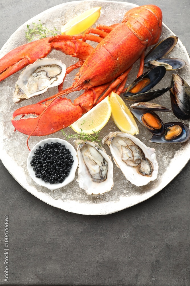 Different sea food on grey table, top view Different sea food on grey table, top view